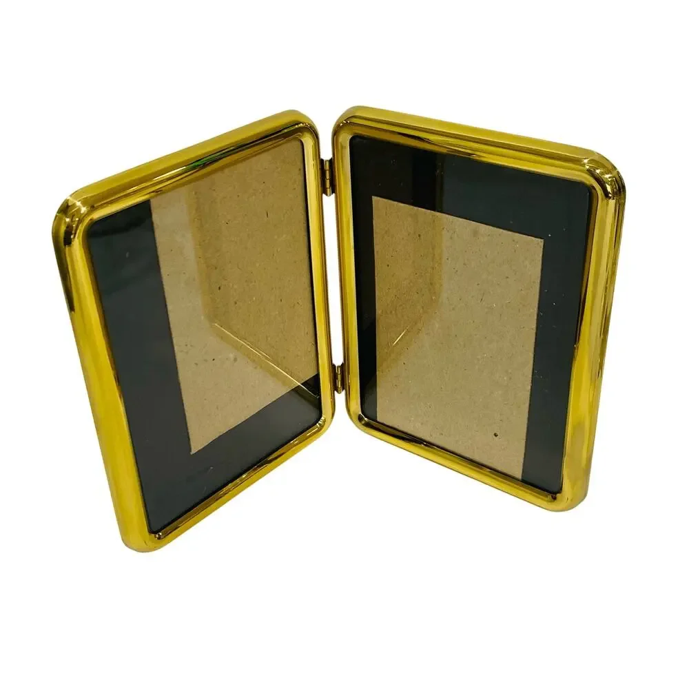 Vintage 1980's double brass photo frame free standing book style holds two 5 x 7